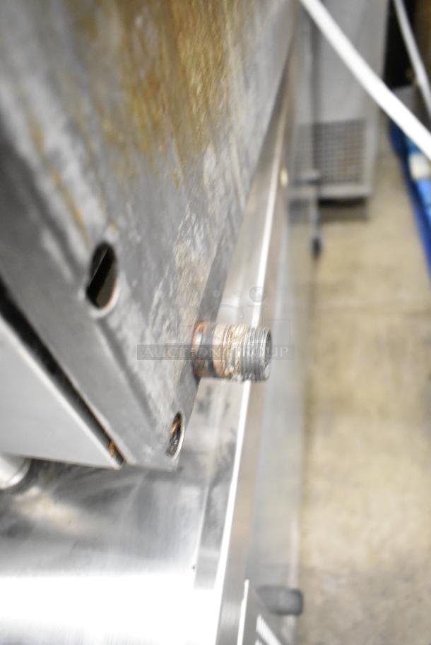 Imperial Commercial Countertop Gas Griddle, showing metal components and surface wear, indicating used condition.