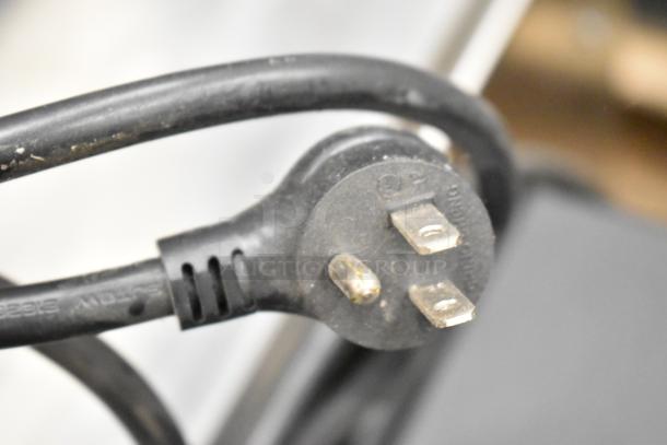 Power cord for True TRCB-48-HC commercial 2 drawer chef base, 115 volts, 1 phase, showing plug and cable details.