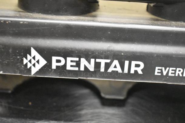 Pentair Everpure Water Filtration System, black, visible logo, likely good condition. Suitable for home water filtration.