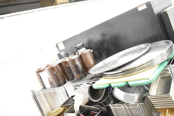 Metro lot with drop-in bins, poly pitchers, cutting boards, rice cooker inserts. Items in good condition; shelving not included.