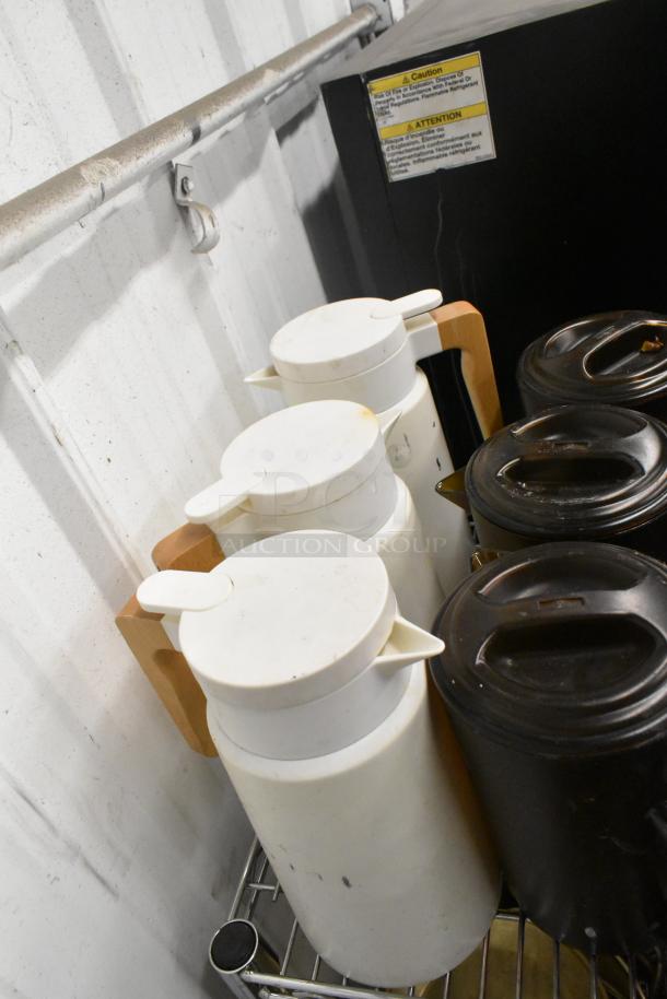 Metro lot featuring white poly pitchers and black rice cooker inserts on wire shelving. Shelving unit not included.