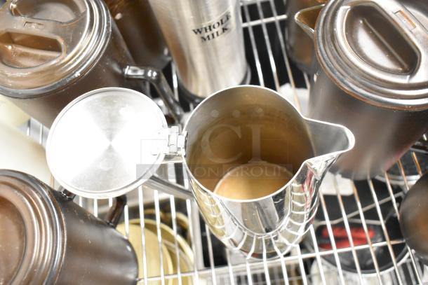 Metro Lot with drop-in bins, poly pitchers, cutting boards, rice cooker inserts; excludes shelving. Good condition.