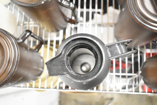 Metro Lot including assorted items like drop in bins, poly pitchers, cutting boards, rice cooker inserts. Shelving not included.