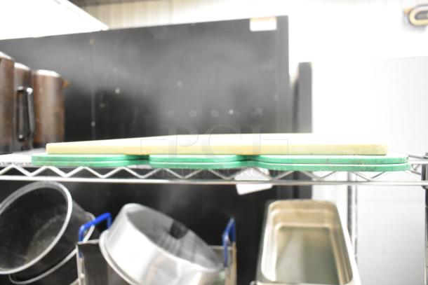 Metro lot with drop-in bins, poly pitchers, cutting boards, rice cooker inserts on wire shelving. Shelving unit not included.