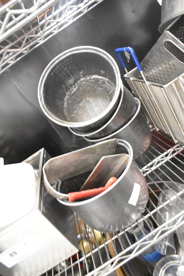 Metro lot of kitchen items including drop-in bins, poly pitchers, cutting boards, and rice cooker inserts. Shelving not included.