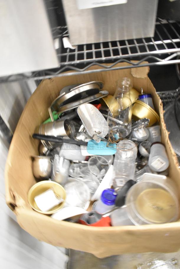 Metro lot of various kitchen items including drop-in bins, poly pitchers, cutting boards, rice cooker inserts, and utensils.