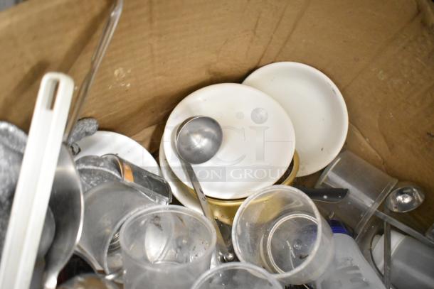 Metro lot including drop-in bins, poly pitchers, cutting boards, rice cooker inserts, utensils in good condition. No shelving included.