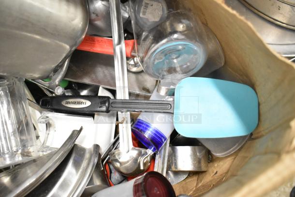 Auction lot of various kitchen items, including drop-in bins, poly pitchers, cutting boards, rice cooker inserts, and utensils.