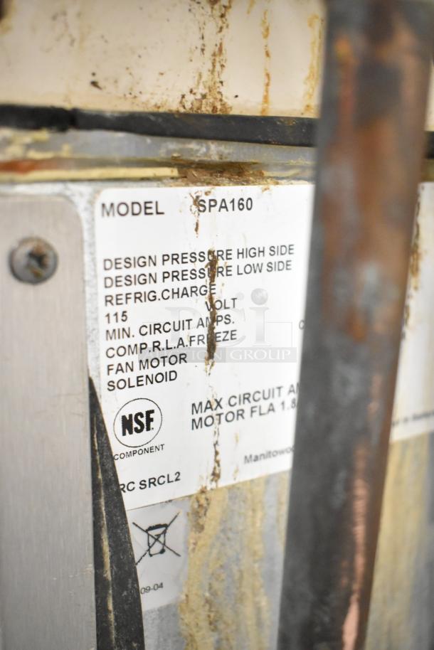 Manitowoc ID0322A-161 ice machine head on SPA160 dispenser, 115V, 1 phase. Visible model label, NSF certified. Used condition.