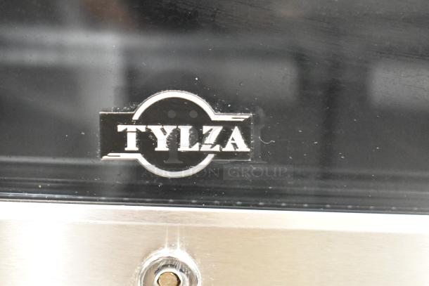 Tylza TYBC150 mini cooler merchandiser logo in black on stainless steel. 115 volts, 1 phase.