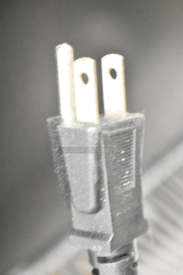 Tylza TYBC150 Mini Cooler Merchandiser power plug, 115 volts, 1 phase, for auction.