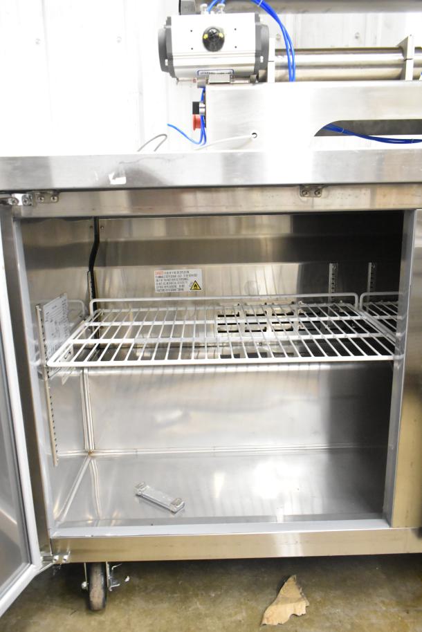 Avantco 178SSUC60RHC Commercial 2 Door Undercounter Cooler. Stainless steel, 115V, 1 Phase, open door view showing interior shelves.