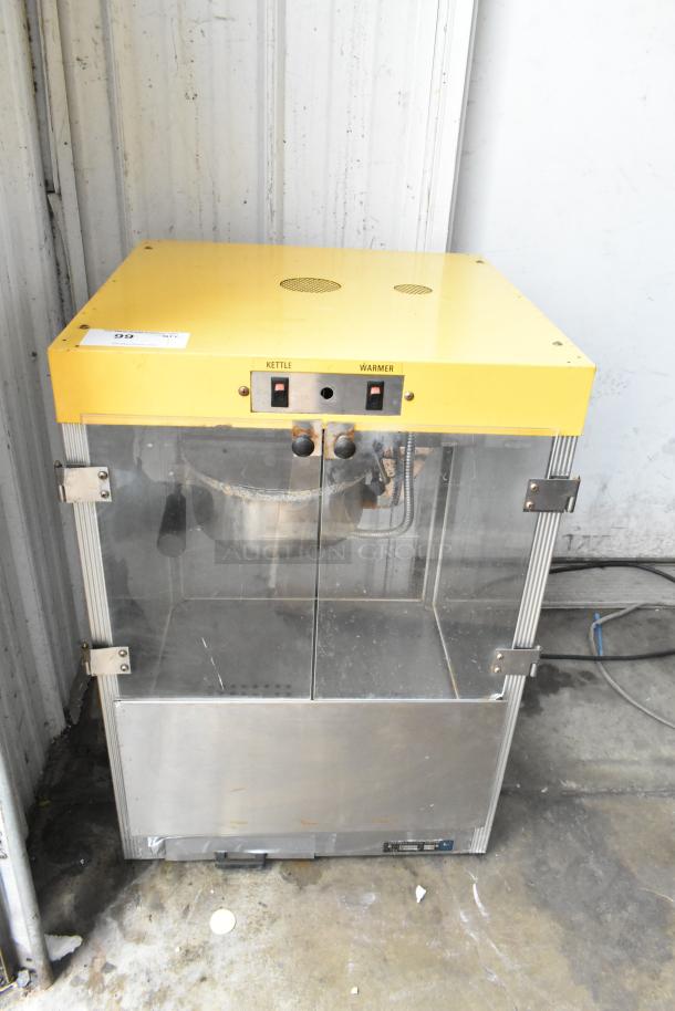 Star 49 countertop popcorn machine, 115 volts, 1 phase. Features kettle and warmer controls. Used condition.