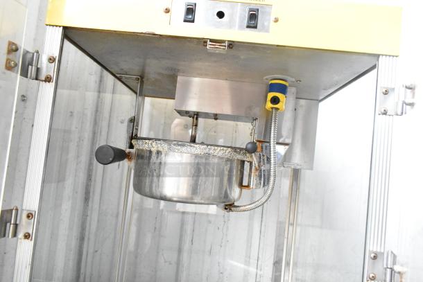 Star 49 countertop popcorn machine, 115 volts, 1 phase. Features include a stainless steel kettle and clear glass panel.