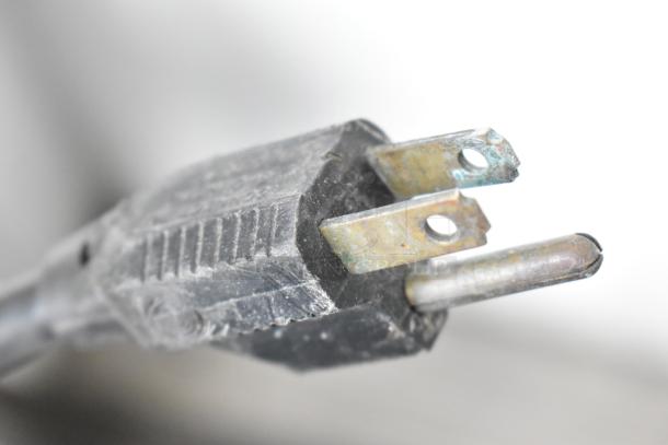 Close-up image of a three-prong power plug for the Star 49 Countertop Popcorn Machine, 115 Volts, 1 Phase.