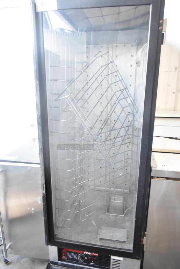 Metro HM2000 heated holding cabinet, clear front, commercial casters, 115V, metal racks inside, good condition.