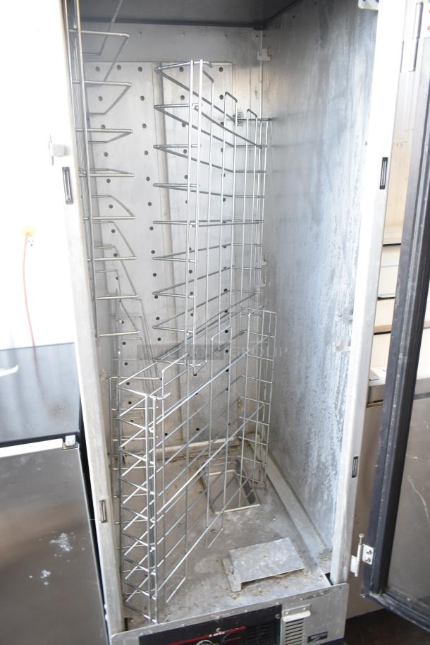 Metro HM2000 Heated Holding Cabinet on casters, 115V, 1 phase, stainless steel, wire racks, used condition.