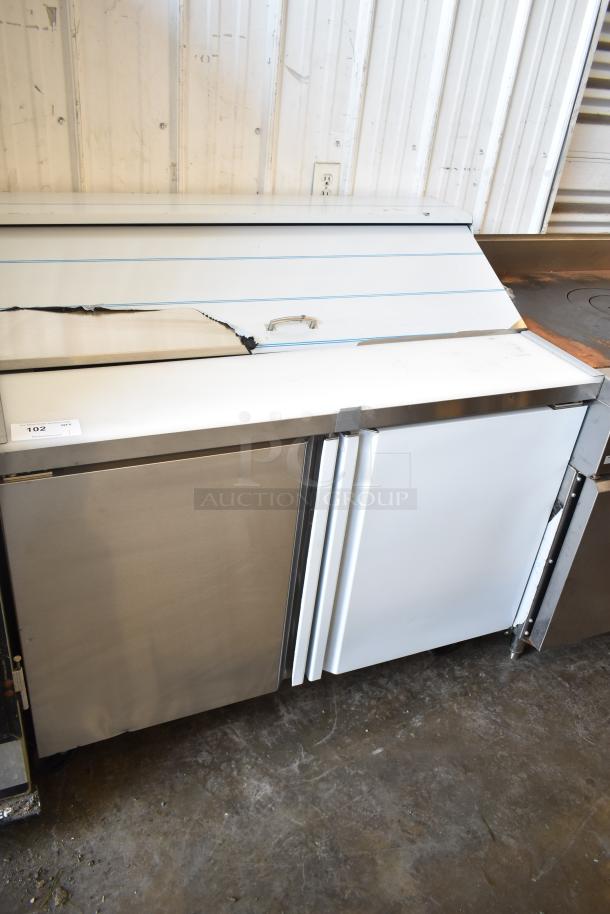 Brand new Kutano KUT24DPT prep table with scratch and dent, commercial casters, 115V, 1 Phase, metal finish.