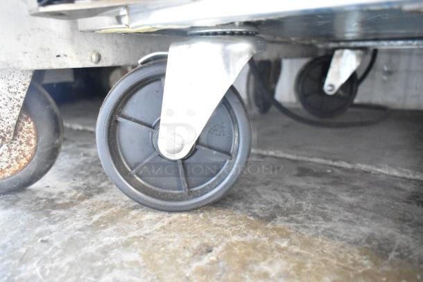 BRAND NEW Kutano KUT24DPT commercial prep table caster. Scratch and dent condition, 115V, 1 phase.