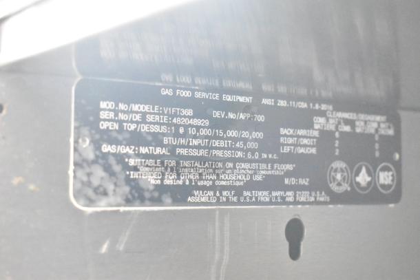 Vulcan V1FT36B commercial gas range label detailing model, serial number, BTU, pressure, and installation requirements.