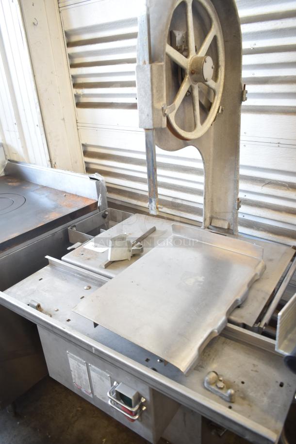 Biro 3334 commercial floor meat saw, stainless steel, used condition, with visible controls and safety features.