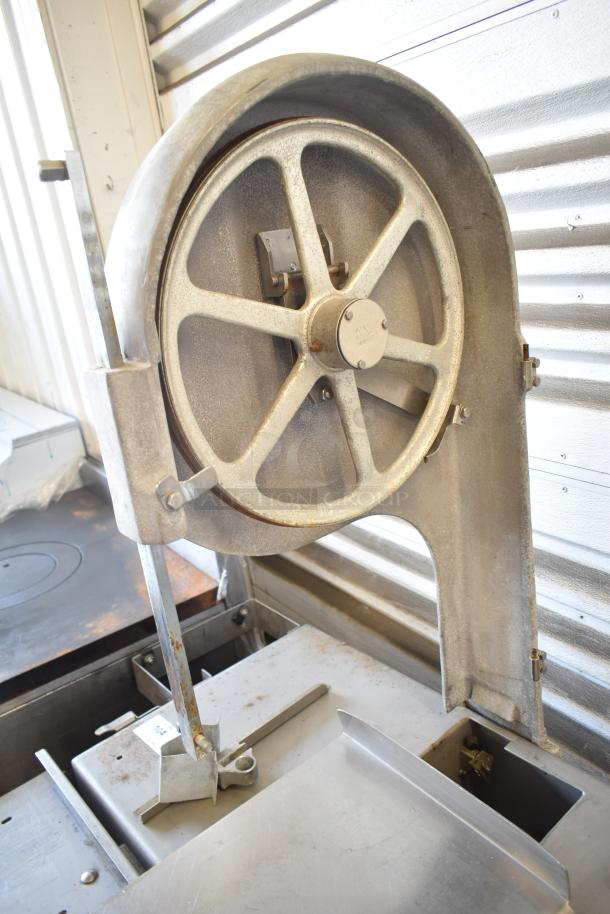 Biro 3334 commercial meat saw, floor style. Features large wheel, sturdy metal construction. Good condition.