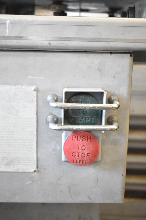 Biro 3334 Commercial Floor Meat Saw controls with push start/stop buttons visible.