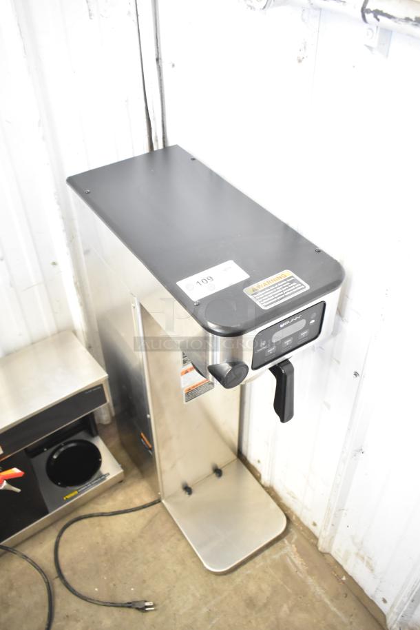 Bunn ICB-DV 53100.0101 stainless steel automatic coffee brewer, tall design, commercial-grade, 120V, controls visible.