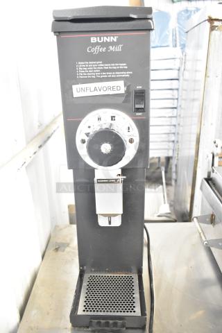 Bunn Commercial Coffee Bean Grinder, 120V, 1 Phase. Features grind settings and "UNFLAVORED" label.