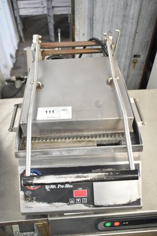 Star Pro Max Commercial Panini Press, countertop model, 115 volts, 1 phase. Visible wear, stainless steel exterior.