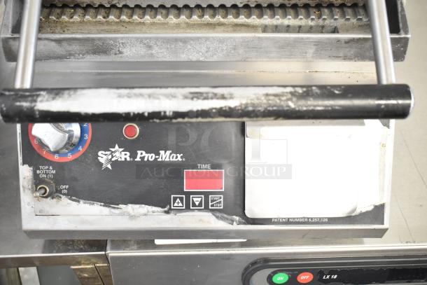 Star Pro Max Commercial Panini Press, 115V, 1 Phase, control panel visible with timer and settings. Used condition.
