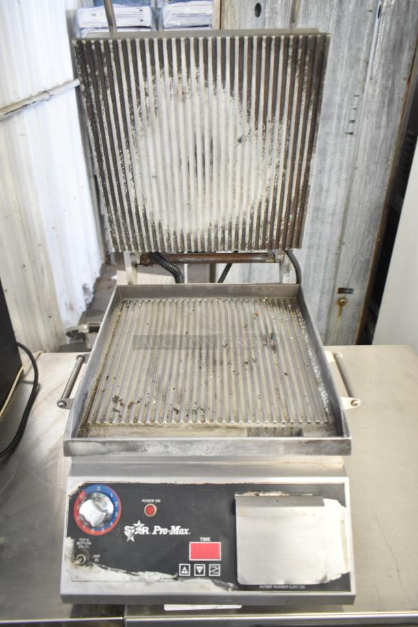 Star Pro Max Commercial Panini Press, 115V, 1 Phase, visible wear, countertop model with ribbed plates, control dial, and power indicator.
