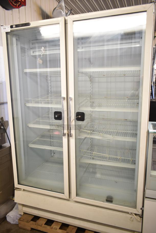 Carrier ULG50BCP-5 commercial 2-door reach-in freezer merchandiser, glass doors, electrical: 115/208-230V, 1 phase, used condition.