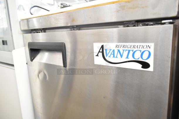 2024 Avantco 178APT27HC prep table with dented stainless steel surface, visible label, and black handle; 115 volts, 1 phase.