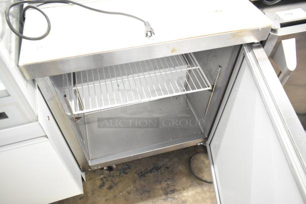 2024 Avantco 178APT27HC commercial sandwich salad prep table. Features bain marie top, commercial casters, and 115V power.