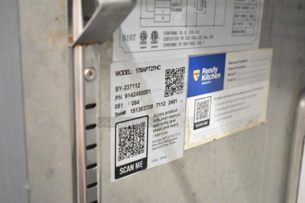 2024 Avantco 178APT27HC commercial sandwich salad prep table, tags show model, serial number, and QR code for product info.