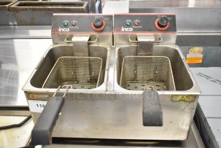 Winco Countertop Electric 2 Bay Fryer with 2 metal baskets, fair condition, visible controls and temperature dials.