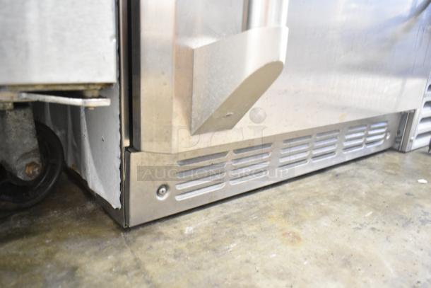 General Electric GE Monogram undercounter cooler, stainless steel, single door, 115 volts, visible lower vent, used condition.