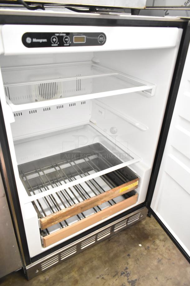 General Electric Monogram undercounter cooler, single door, glass shelves, stainless steel details, 115V, 1 phase, good condition.