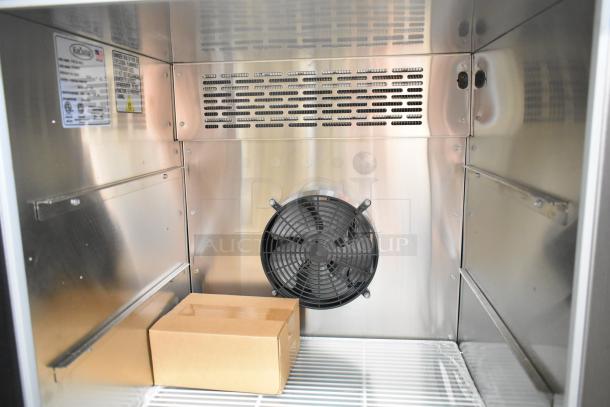 2022 Krowne FMC24-BS-L commercial underbar freezer in stainless steel. Features include cooling fan and interior labeling.