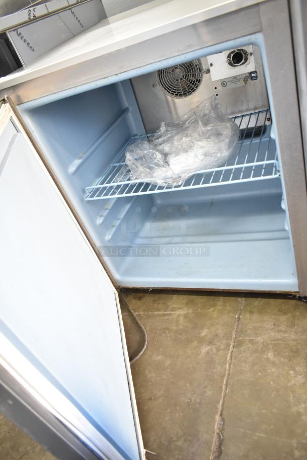 Delfield 406CA-DHL-DD1 undercounter cooler, single door, 115V, 1 phase, metal interior, wire shelf, clean condition.