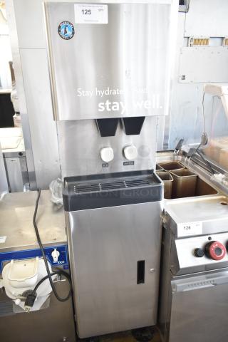Hoshizaki commercial water and ice dispenser in stainless steel, dual spouts, labeled ice and water, good condition.