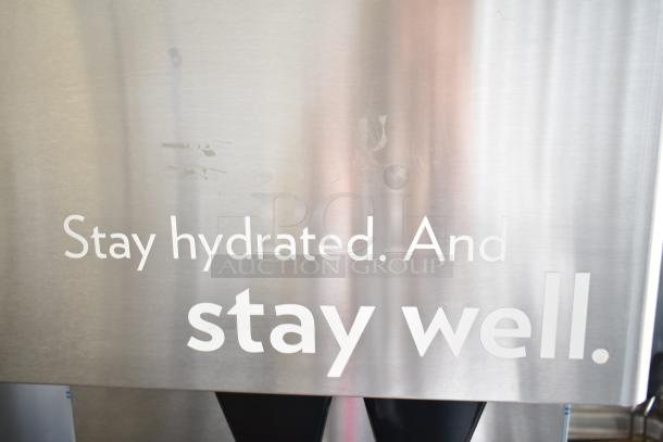 Hoshizaki Commercial Water and Ice Dispenser, stainless steel finish, branding text: "Stay hydrated. And stay well."