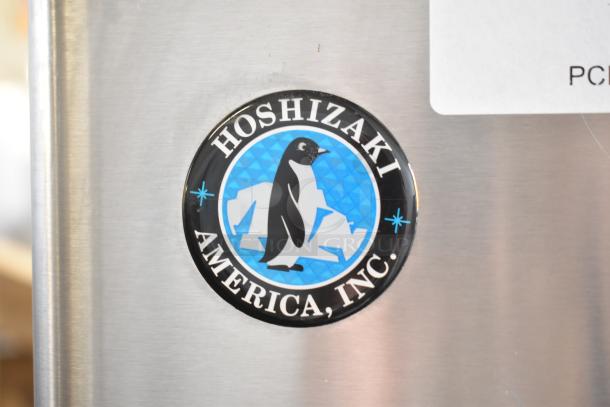 Hoshizaki Commercial Water and Ice Dispenser with logo, stainless steel finish, Hoshizaki America, Inc. branding.