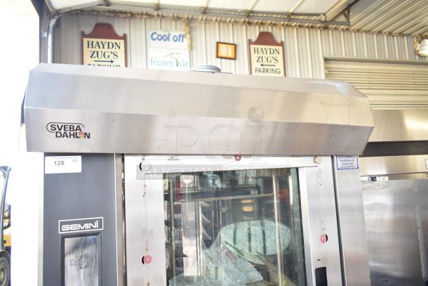 Sveba Dahlen Gemini commercial mini rotating rack oven on casters, stainless steel, visible Sveba Dahlen and Gemini labels.