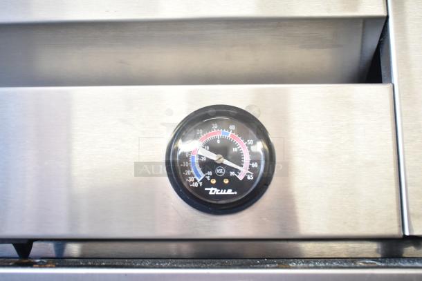 True T-35 commercial cooler gauge, stainless steel finish, temperature display, brand label visible.