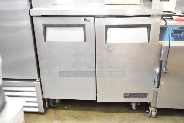 True TSSU-36-08 undercounter cooler, silver, two-door, on commercial casters, 115V, 1 phase, used condition.