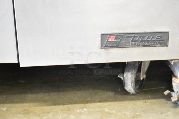 True TSSU-36-08 commercial undercounter cooler, two doors, on casters. Visible True logo plate. 115V, 1 phase.