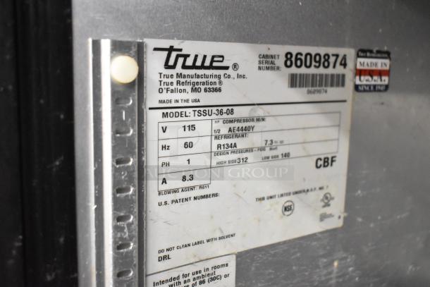True TSSU-36-08 commercial cooler label showing model, voltage, refrigerant details, and serial number.
