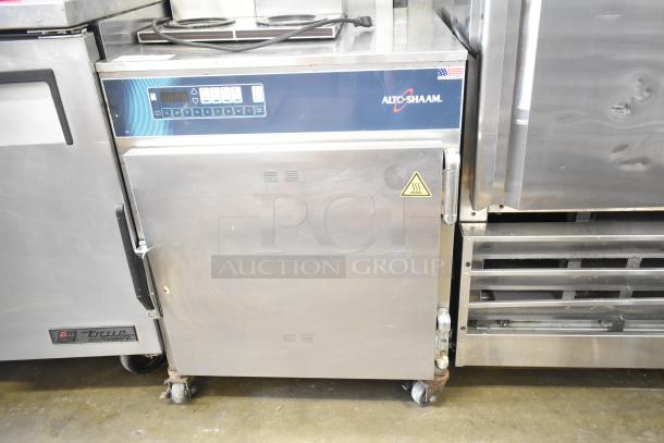 Alto Shaam Heated Holding Cabinet with digital controls, stainless steel finish, on commercial casters, in used condition.